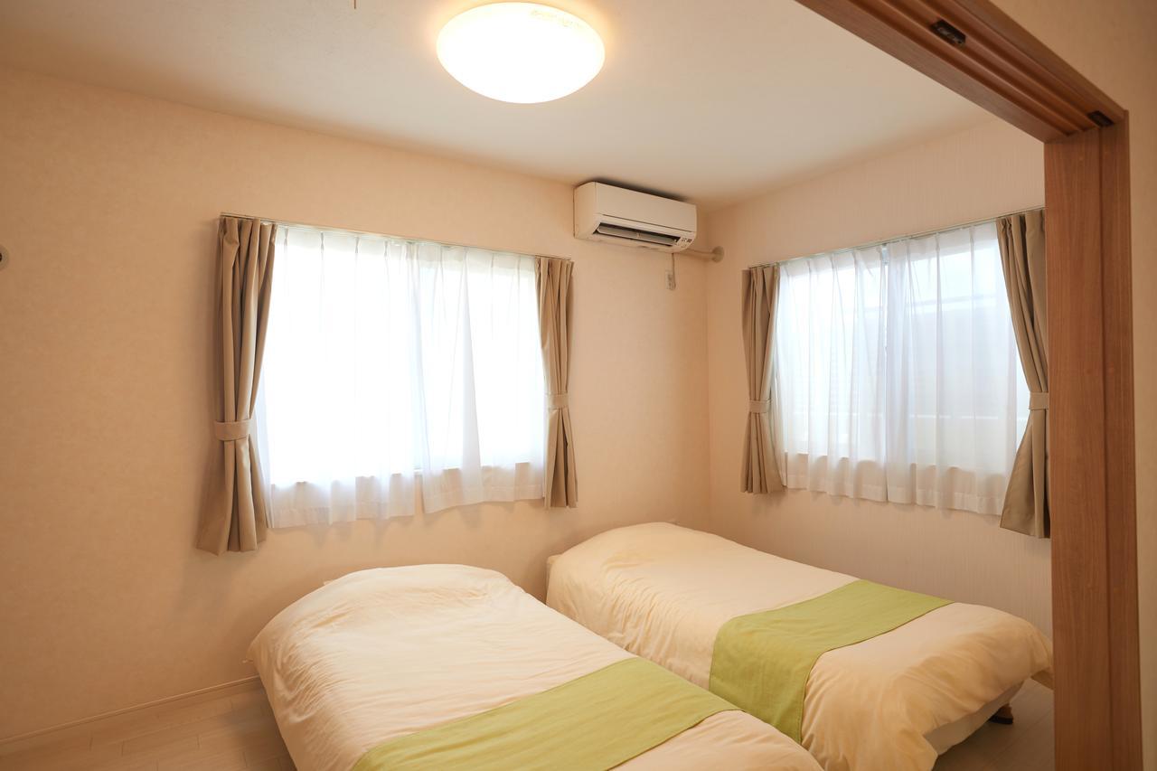 Rainbow Terrace Ginowan Apartment Bagian luar foto